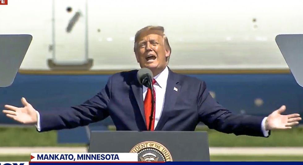 ‘I’ll just give you a big, fat kiss’: Trump vows to walk into rally audience to smooch the ‘beautiful women’