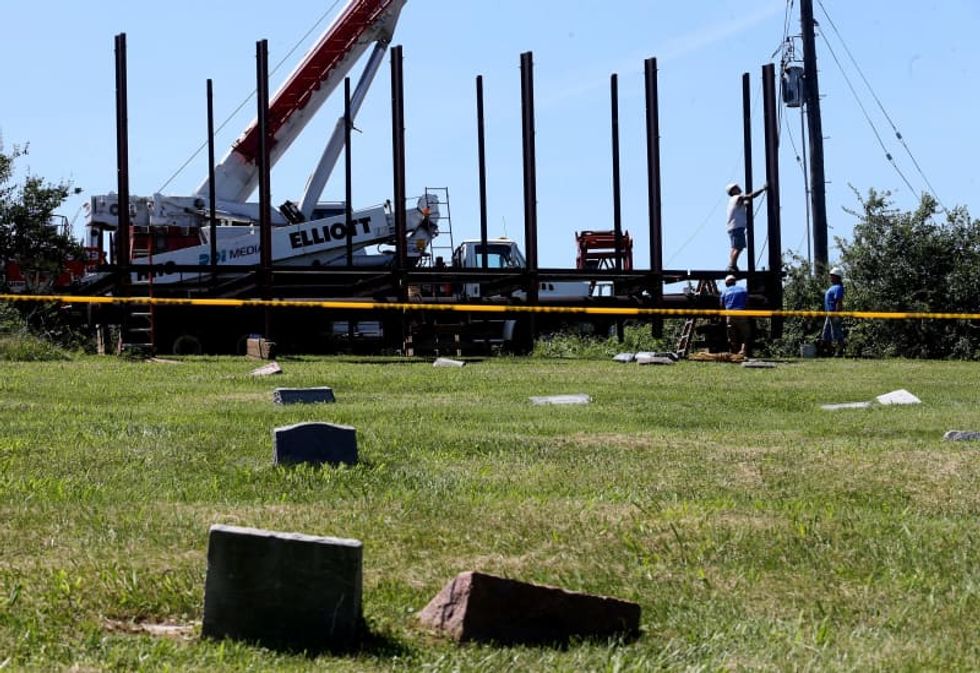 'Black Lives do matter, even after death': Billboards in historic, Black cemetery coming down after activist's fight