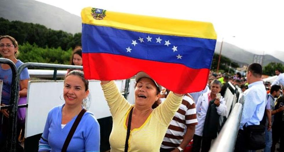 Venezuelans pour into Colombia again to buy necessary supplies as border reopens