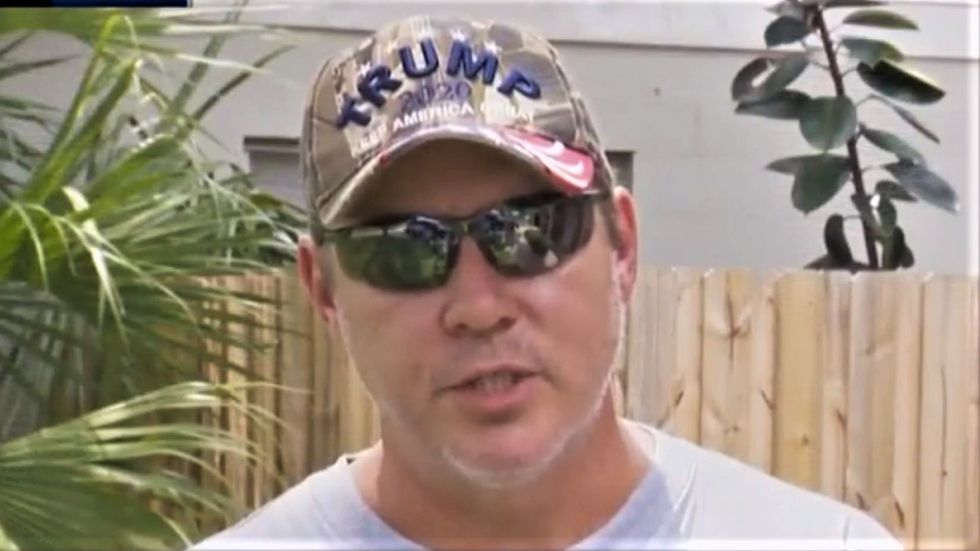 Trump supporter brags that he 'went to jail for our president' after punching Biden-backing neighbor