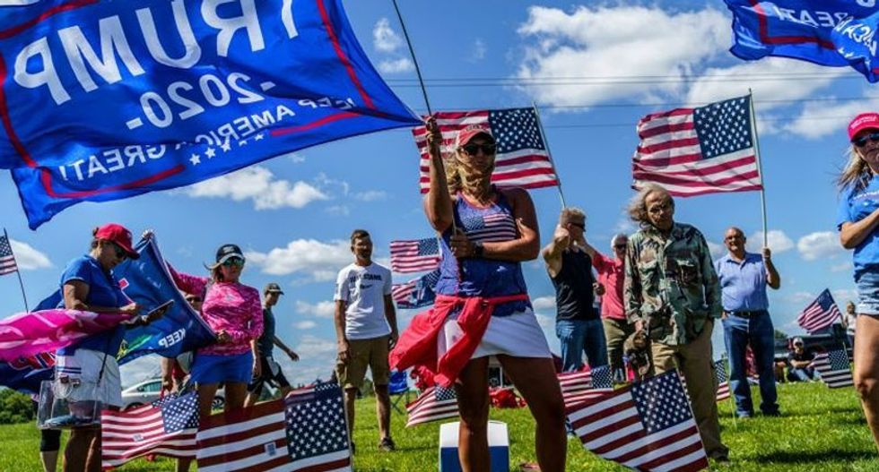 Park goer accosted by gun-toting Trump boater for wearing a face mask in public: report