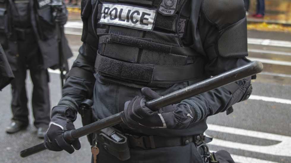 WATCH: Tucson cop body slams young woman during unrest after U of A b-ball loss