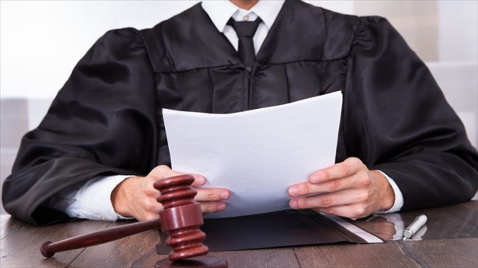 Denver man charged with seven felonies for handing out 'jury nullification' fliers outside courthouse