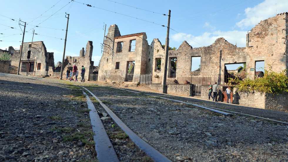 Vandals scrawl Holocaust-denying graffiti on memorial at French massacre village