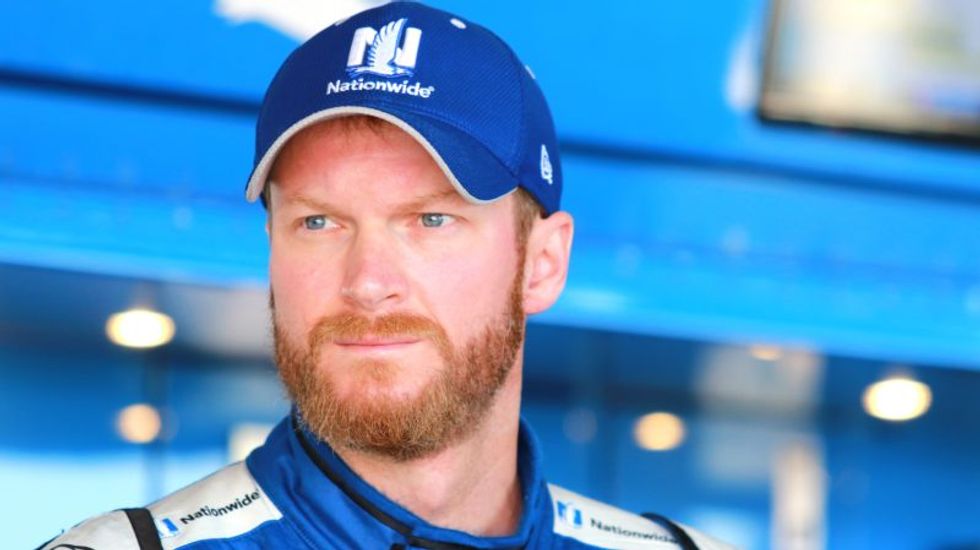 Racing star Dale Earnhardt Jr. defies NASCAR owners to show solidarity with NFL protesters
