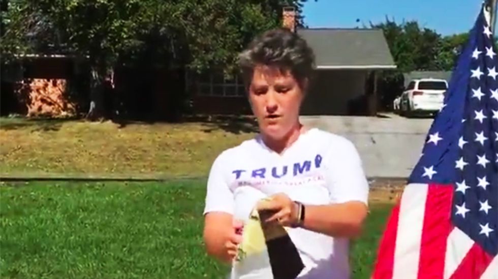WATCH: Trump fan attempts to set fire to her Steelers flag and jersey --  and fails miserably