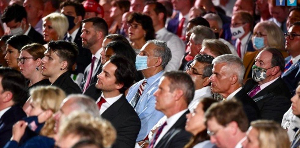 'Everybody is going to catch this thing eventually': Senior Trump official brushes off criticism of maskless crowd at RNC