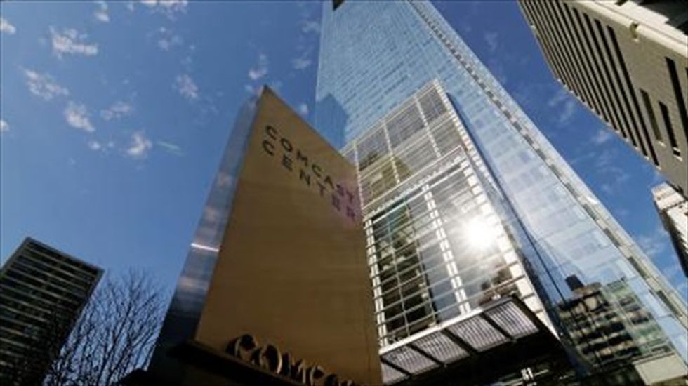 Comcast defends Time Warner mega-merger as criticism increases