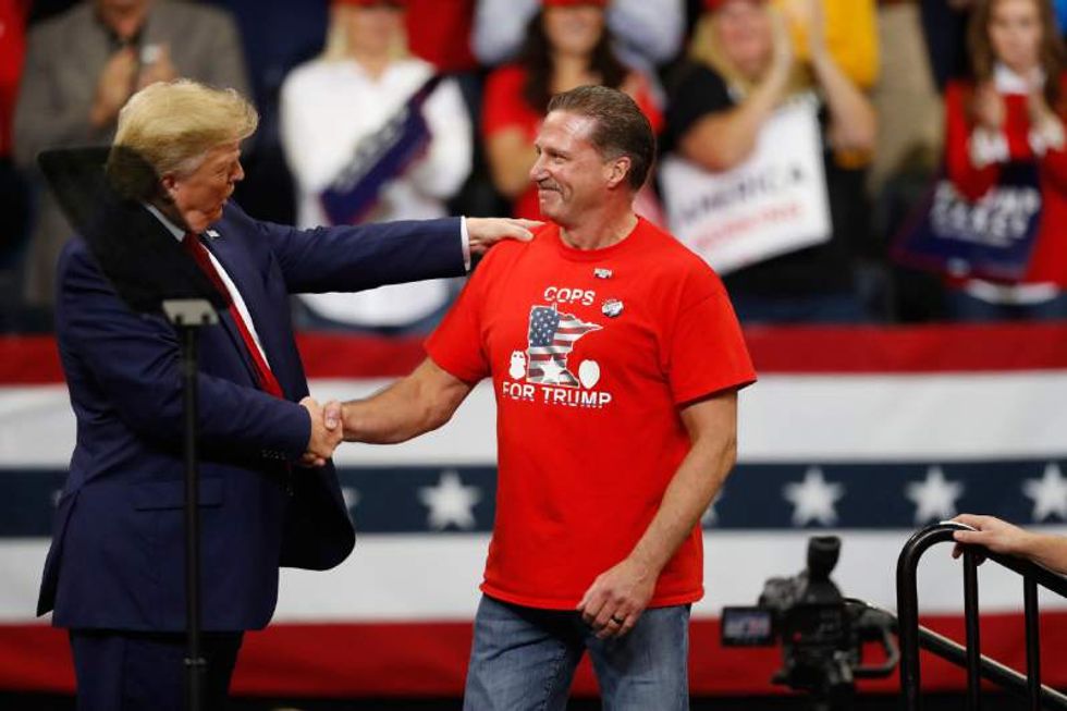 Trump-loving Minneapolis police union boss calls the cops on a reporter for knocking on his door