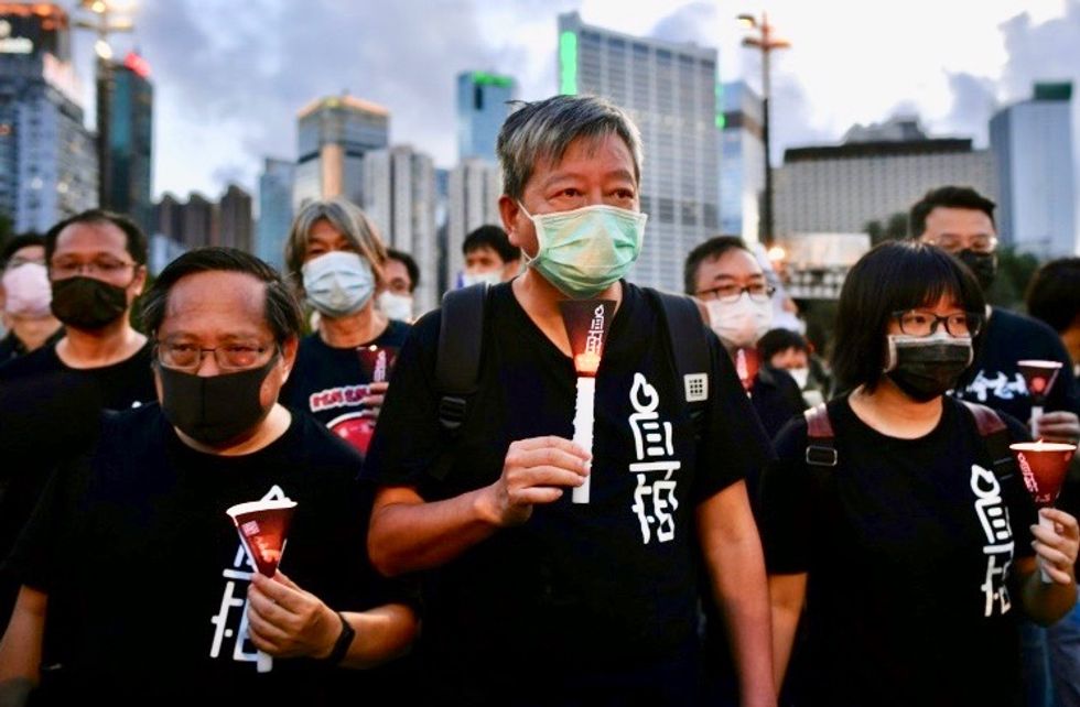 Hong Kong protesters defy Tiananmen vigil ban