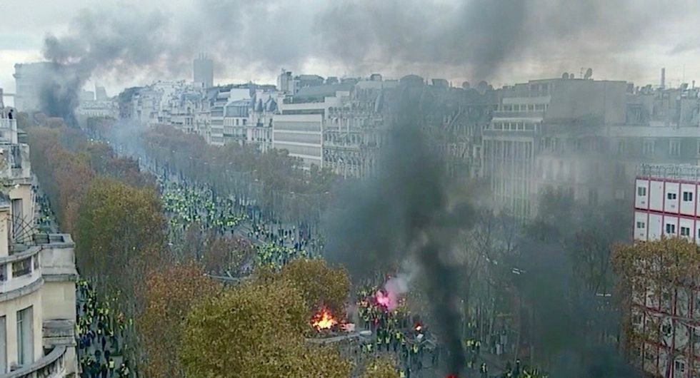 WATCH: Utter anarchy on Champs-Elysees as Paris erupts in fiery protests over fuel prices