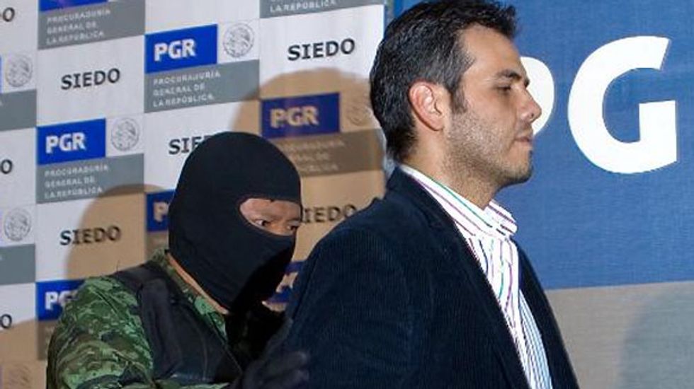 Son of fugitive Mexican cartel leader cooperating with U.S.