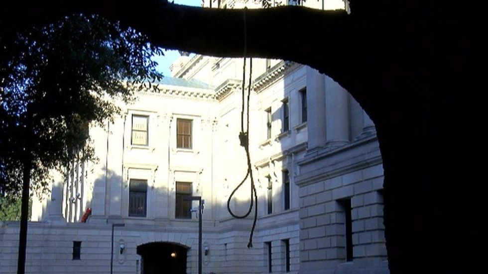 Two nooses found on trees at Mississippi Capitol as voters decide on candidate who joked about 'public hanging'