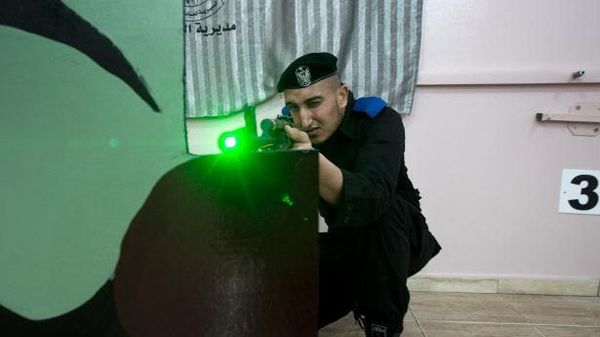 Gaza cops save money by trading in bullets for makeshift laser guns