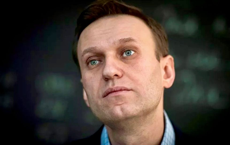 Macron urges Putin to shed light on 'attempted murder' of opponent Navalny