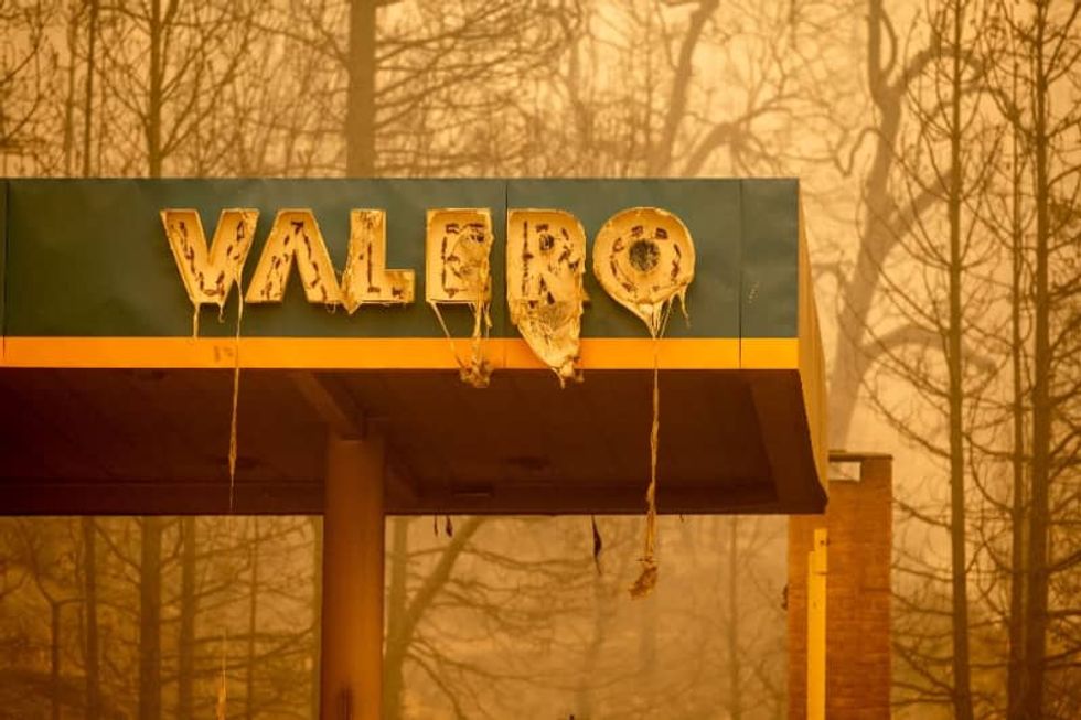 Sixteen dead in US wildfires as officials say toll could rise