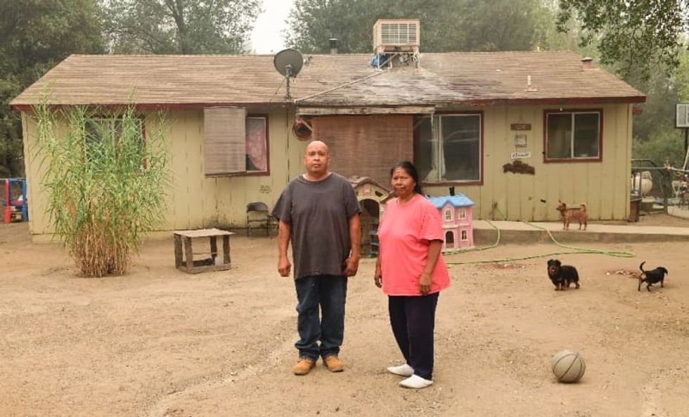 'Not leaving': Residents are defying evacuation orders to ride out California fires