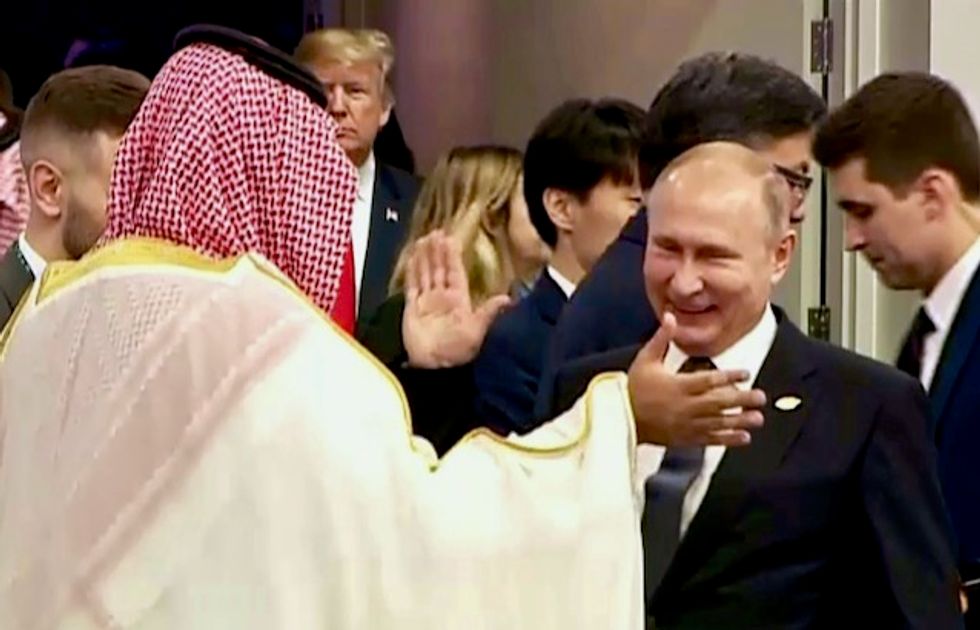 Saudi prince back on stage to Putin delight, Macron warning