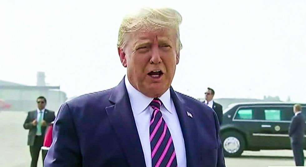 'I don't think science knows': Trump bickers about the Earth getting 'cooler' at wildfire roundtable