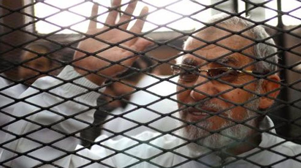 Egypt court sentences 683 to death including Muslim Brotherhood leader