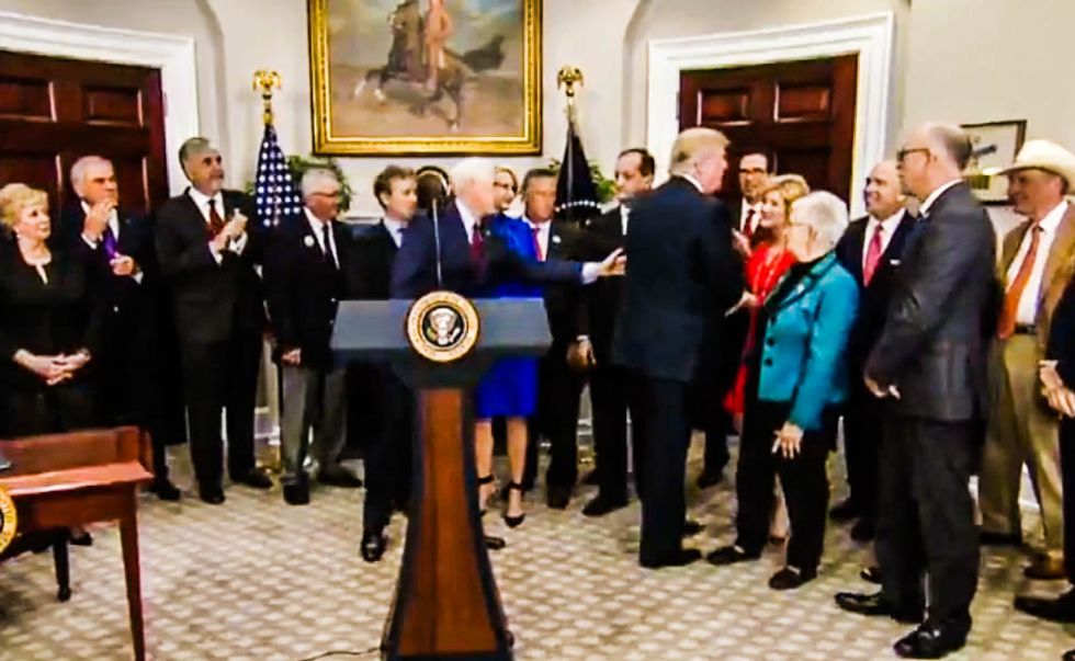 WATCH: Pence stops Trump from leaving executive order signing ceremony without signing the order -- again