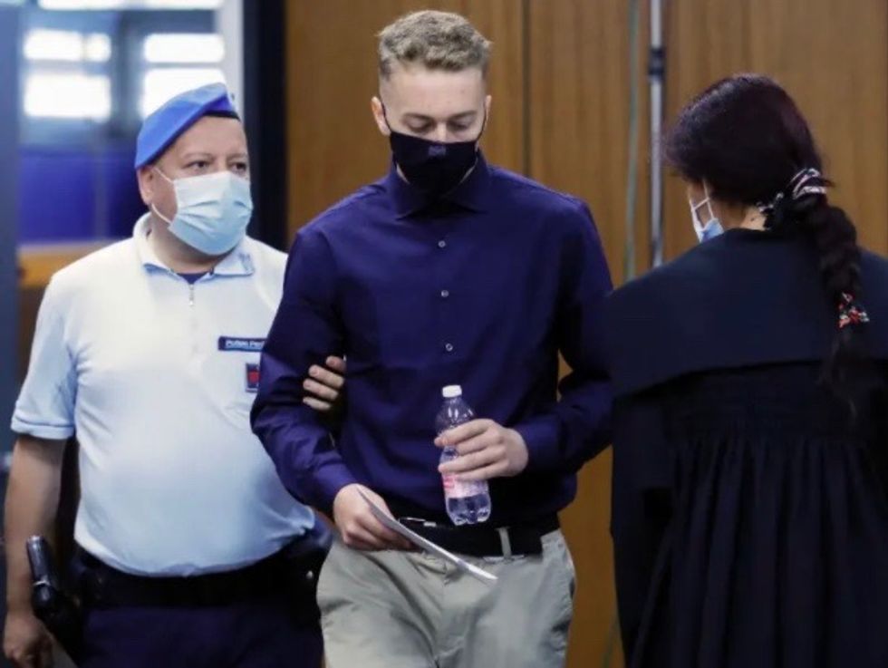 US student charged with murder of Italian policeman apologizes in court
