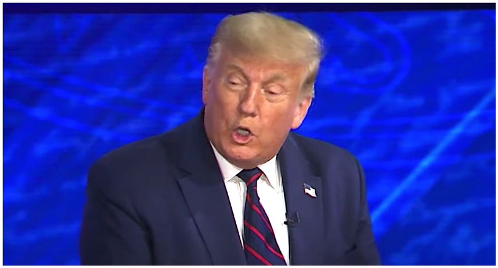 Trump goes on all-cap rage attack at Democrats in early morning tweet from hospital