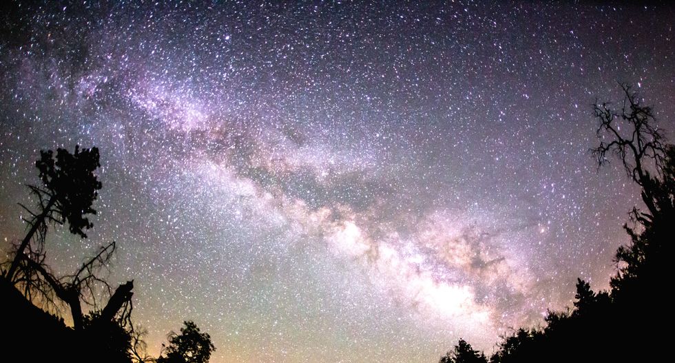 Galactic tug-of-war propels Milky Way through the universe