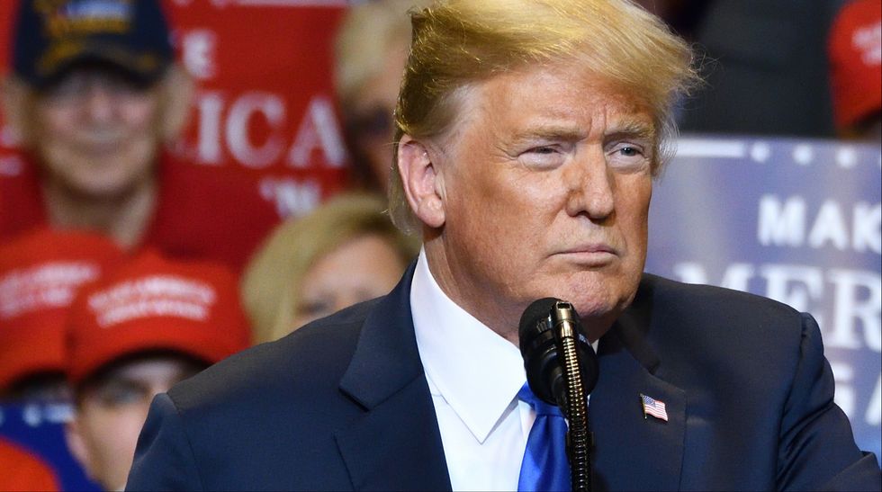 'If he’s sick, then they planted it': Trump supporters question whether he has COVID