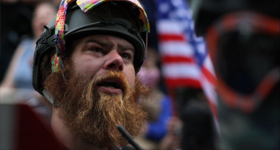 In 'extraordinary step,' international crisis group issues report warning of US election violence