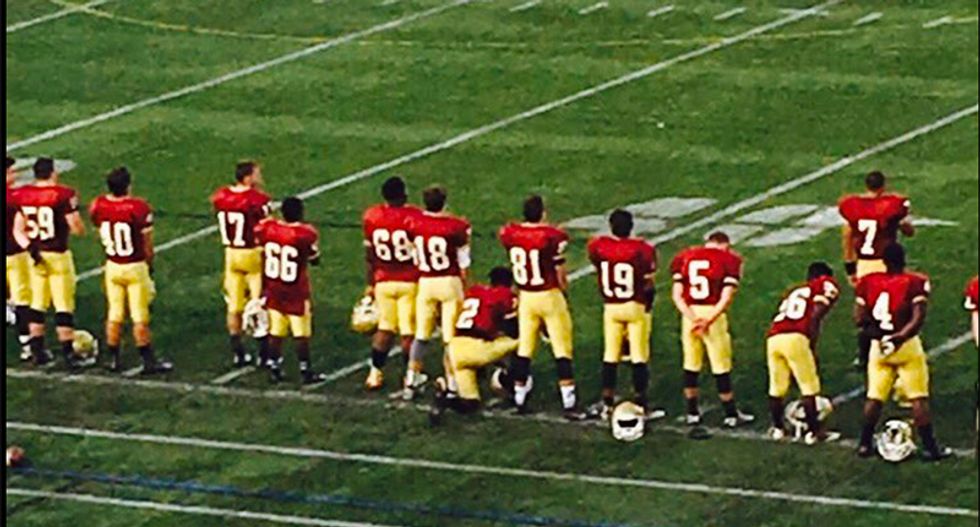 School lifts suspension of student for kneeling to protest national anthem before football game