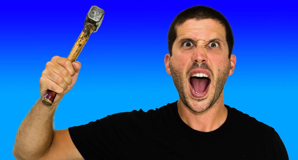 Racist beachgoer takes kid's football and goes on hammer rampage after teens confront him