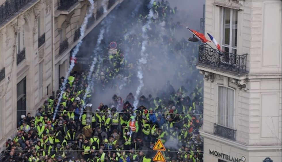 Tear gas, mass arrests as new 'yellow vest' protests hit Paris