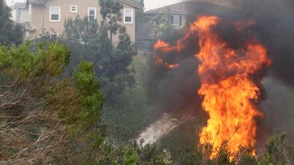 'Fire in the sky': Massive fires force 20,000 people to evacuate in southern California