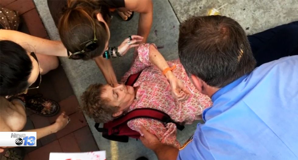 Police hunt for Trump supporter who sucker-punched 69-year-old woman outside NC rally