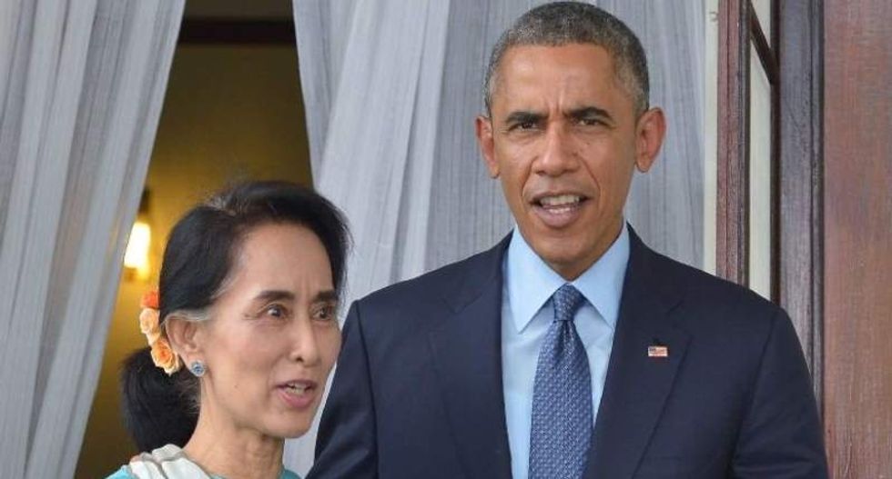 Obama vows to lift Myanmar sanctions during visit from ex-political prisoner Suu Kyi
