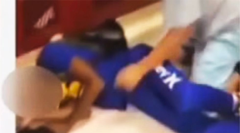 Virginia school investigated after athletes simulate rape of pinned-down black students while yelling racial slurs