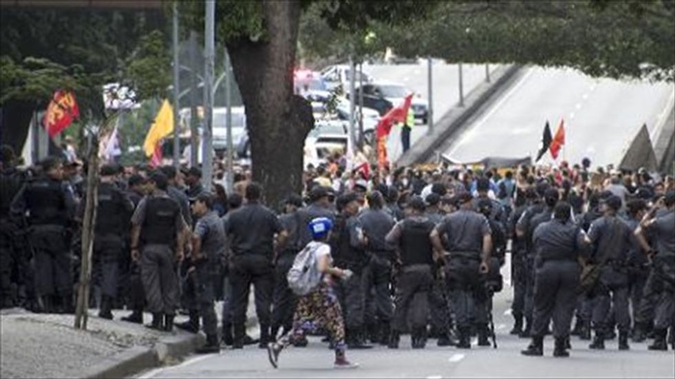 Brazil mobilizes 157,000 cops and troops for World Cup security