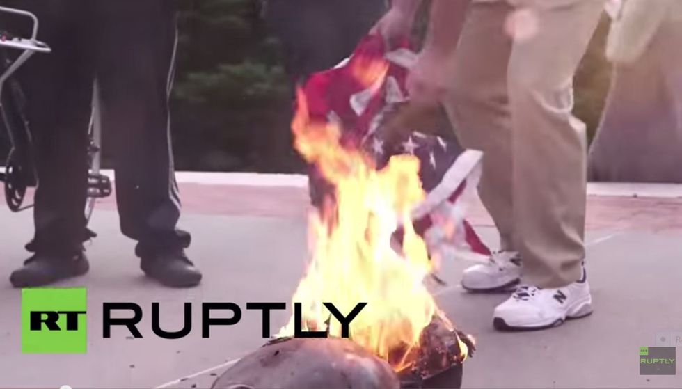WATCH: Anarchists spark chaos by burning American and Confederate flags in a Brooklyn park