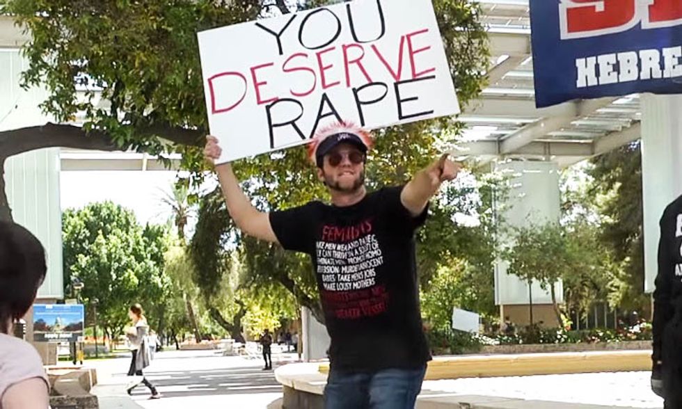 Students celebrate as infamous 'You Deserve Rape' campus preacher arrested for kicking woman