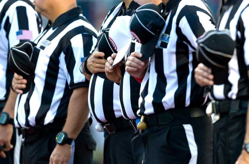 Refs walk off in protest after players kneel during anthem at New Jersey football game