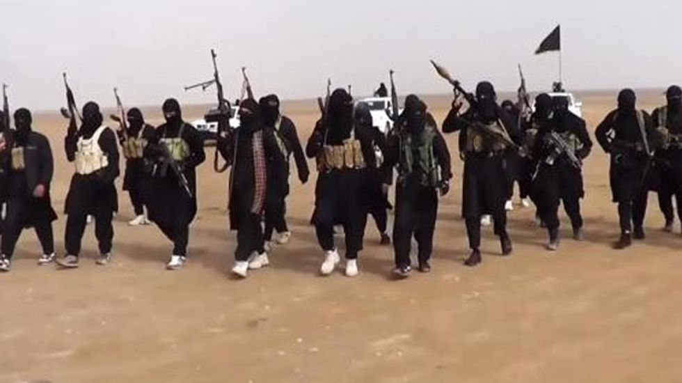 Half a million people flee as ISIS militants seize the Iraqi cities of Tikrit and Mosul