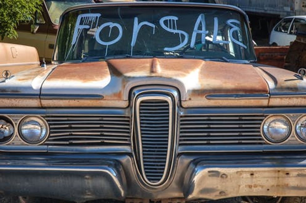 Stumped by the stock market slump? Start by picturing a used car dealership
