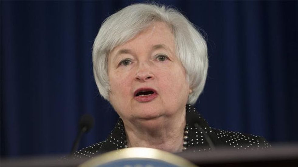 Federal Reserve holds course on lowered U.S. growth forecast