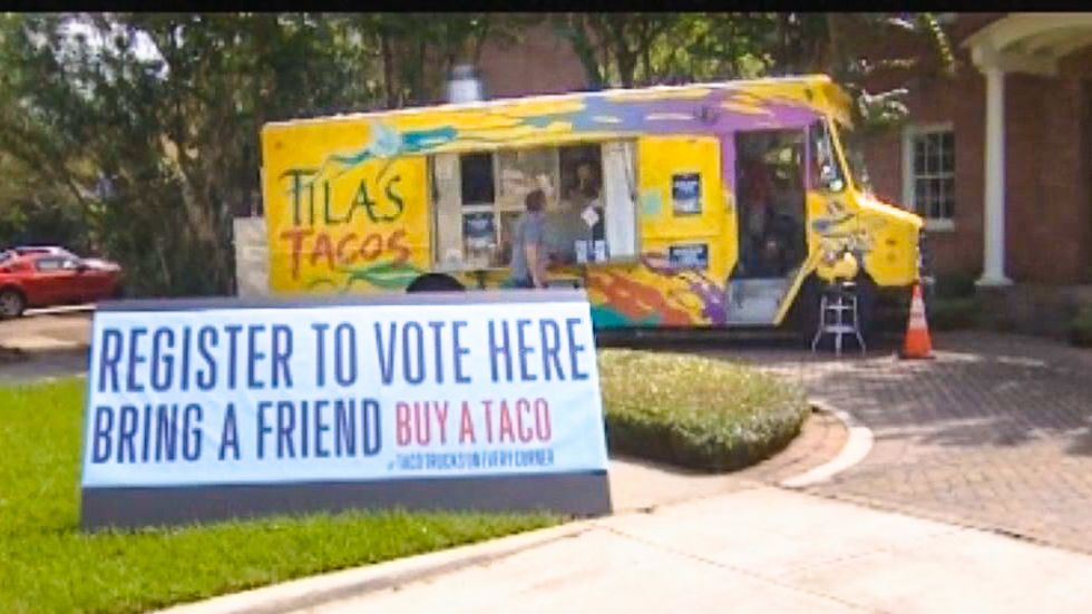'Register to vote, get a taco': Houston taco trucks put voter registration booths 'on every corner'