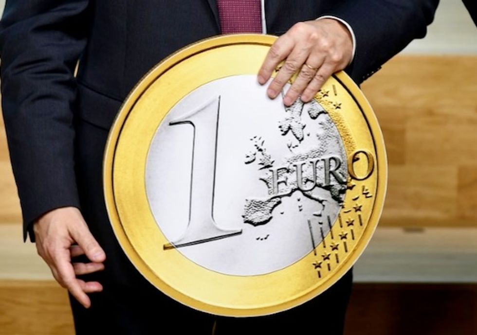 At 20, euro is currency giant on fragile footing