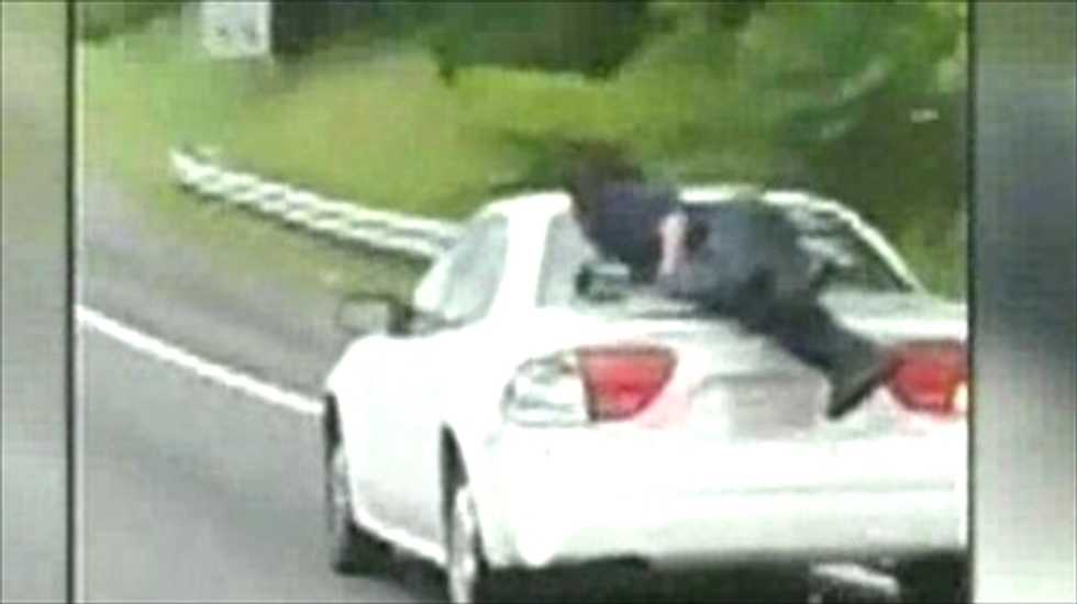 NC cops searching for mystery man caught hanging onto vehicle in highway traffic