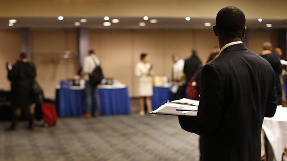 Unemployment rate falls to near six-year low of 6.1 percent