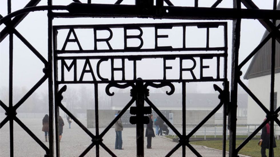 Walmart sorry for selling decorative Nazi 'work makes you free' poster
