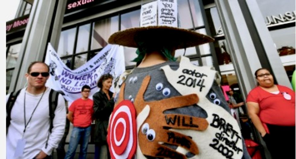Hundreds join #MeToo march in Hollywood against sexual abuse